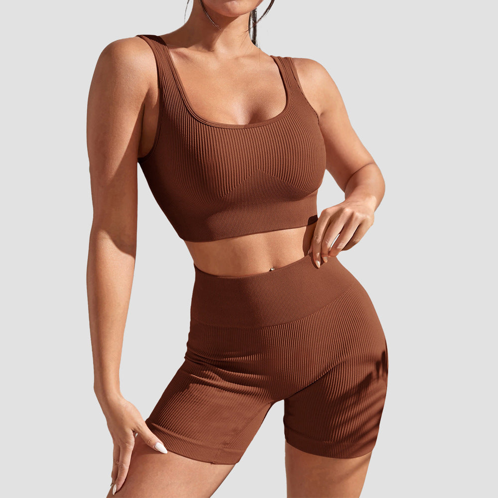 Dark red activewear bra and pant set with high waist shorts and stretch support