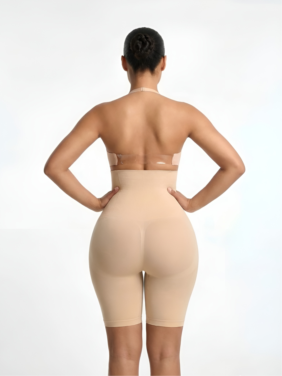 Back view of nude butt-lift shaping shorts with lifting support and seamless body shaping