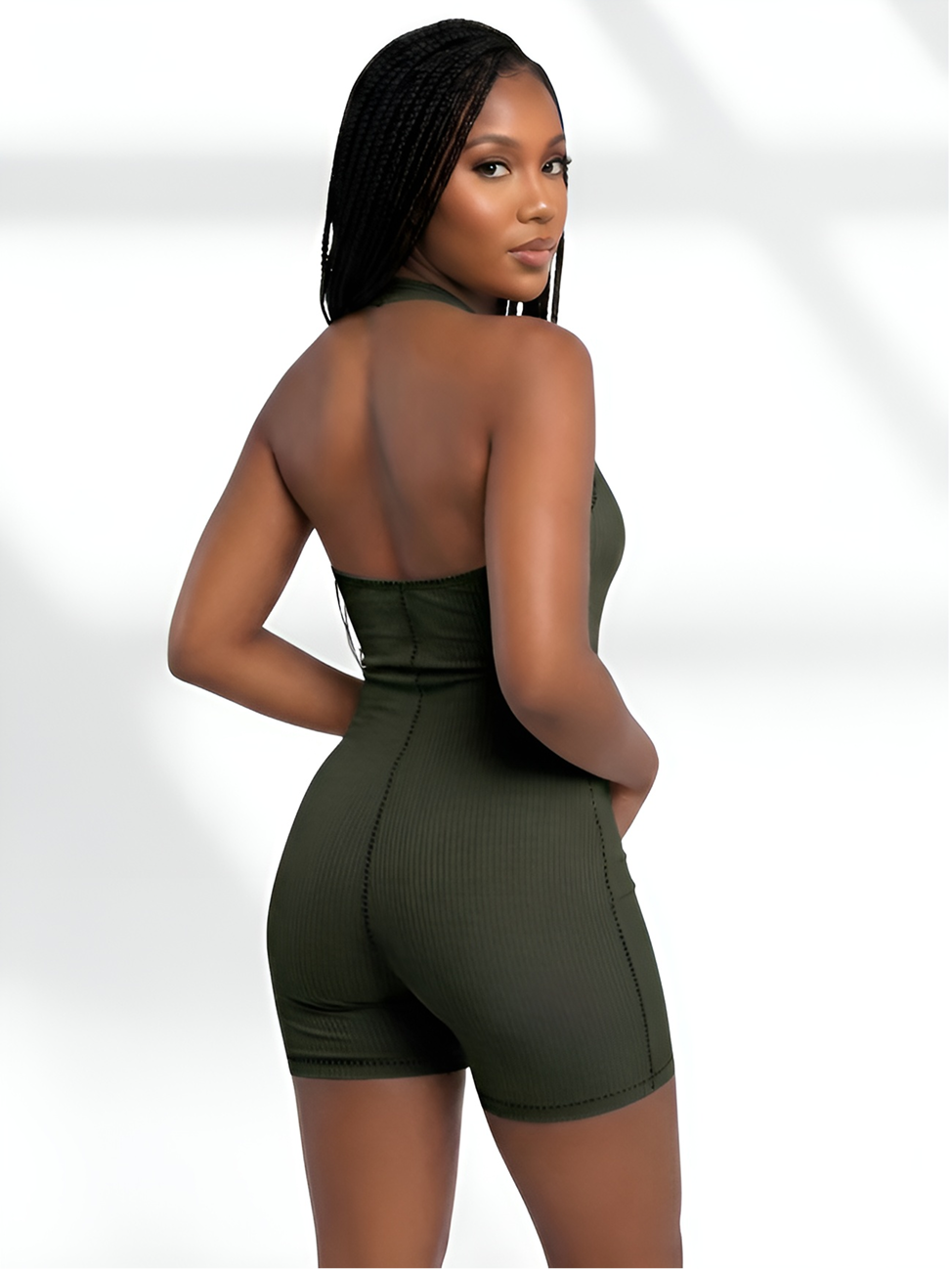 Back view of olive green sculpting romper shaper with seamless shaping support