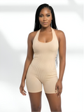 Beige sculpting romper shaper for women with seamless tummy control and smooth fit