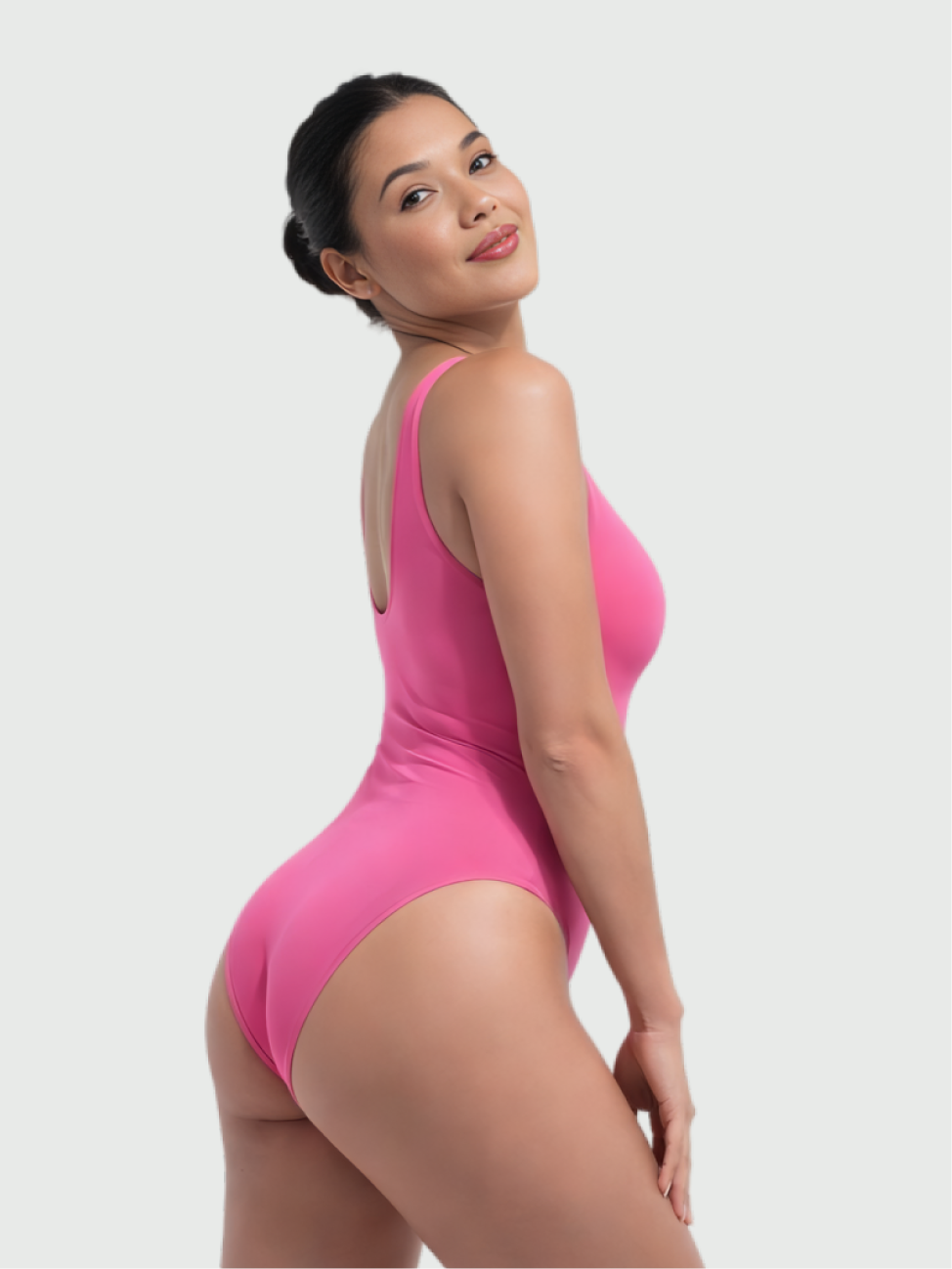 Side view of pink bust support bodysuit with body-contouring and shaping fit