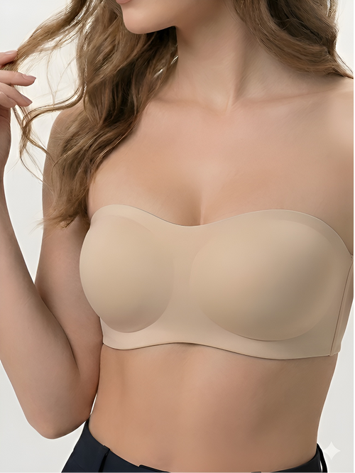 Close-up of nude strapless push-up bra with seamless padded cups for women